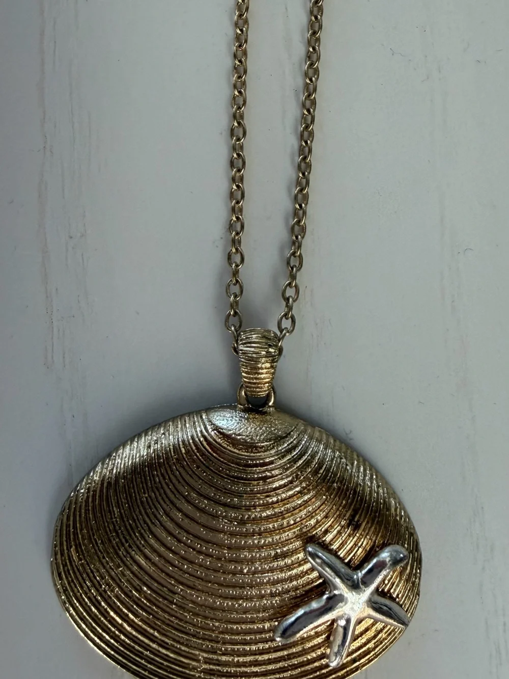 Gold Tone Shell Pendant Necklace with Silver Starfish Accent